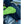Person wearing a California Heat electric vest and balaclava working on a car engine
