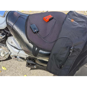 California Heat heated seat cushion with battery pack and controller on a motorcycle seat