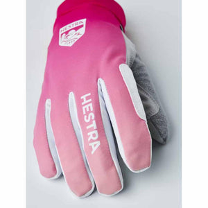 Hestra pink ski glove with white logo and grey palm