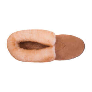 Top view of a tan suede slipper with a cream sheepskin lining