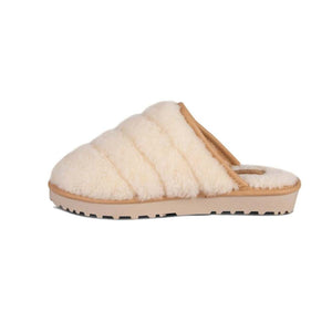 Cloud Nine Sheepskin cream quilted sheepskin slipper with tan trim and flat rubber sole
