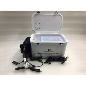 CompCooler ice station cooling unit with open lid and attached power cables