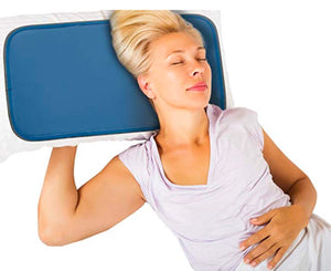 Person resting head on a Cool Care Technologies blue cooling pillow insert
