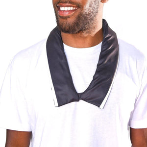 Man wearing a black cooling neck wrap over a white t-shirt
