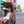 Cool On The Go portable fan attached to a stroller canopy blowing air on a child