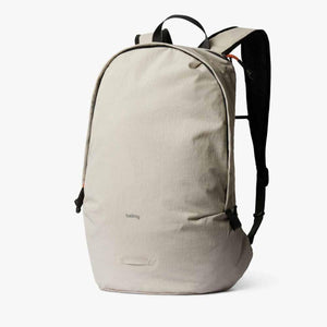 Beige Bellroy backpack with black straps and zipper details