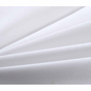 Close up of white fabric with soft folds