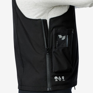 Side view of black heated vest with zippered pocket and technology icons