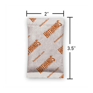 HotHands hand warmer packet with dimensions labeled as 2 inches by 3.5 inches