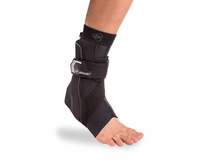 DonJoy black ankle brace worn on a human foot