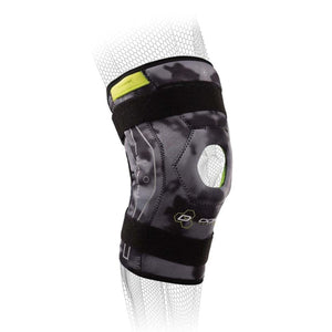 DonJoy knee brace with black and grey camouflage pattern and neon yellow accents