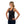 Woman wearing a black DonJoy back support brace over a black tank top