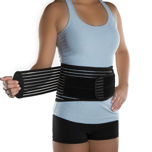 Person wearing a black DonJoy back brace with adjustable elastic straps