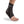 DonJoy black ankle support brace worn on a foot