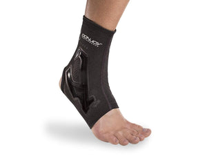DonJoy black ankle support brace worn on a foot