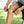 Person adjusting a DonJoy knee strap on their leg
