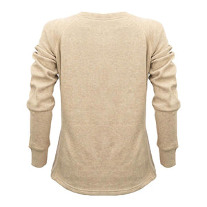 Back view of a beige long sleeve thermal knit shirt with ribbed cuffs