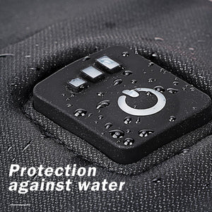Water droplets on a black power button control panel with three indicator lights