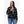 Woman wearing a black and white plaid Mobile Warming zip up jacket with front pockets