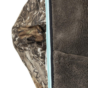 DSG Outerwear jacket showing camo sleeve and brown fleece interior with light blue zipper