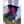 DSG Outerwear black winter boots with bright pink laces on a mossy log in the snow