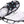 Due North ice traction cleats attached to a white athletic shoe