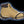 Due North traction aid attached to a tan work boot