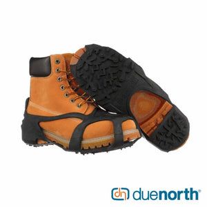 Due North ice traction cleats attached to a tan work boot