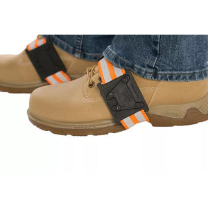 Due North Quick Grip ice cleats on tan work boots