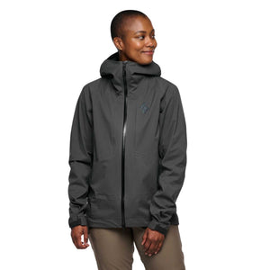 Person wearing a dark grey Black Diamond hooded shell jacket