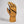 Swany tan leather ski glove with black accents and a zippered pocket on the back of the hand