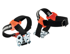 Pair of black and orange Yaktrax ice cleats with metal spikes and adjustable straps