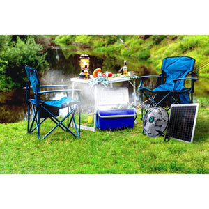 ExtremeMIST solar powered fan and camping chairs by a river