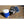 ExtremeMist portable misting fan with water cooler and solar panel on stone patio