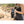 Person holding an ExtremeMIST portable personal cooling mister in a desert setting