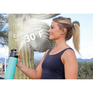 ExtremeMIST water bottle spraying a cooling mist outdoors