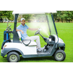 Golfer in a cart using an ExtremeMIST cooling mister