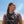 Person wearing an ExtremeMIST hydration vest with integrated misting nozzle outdoors