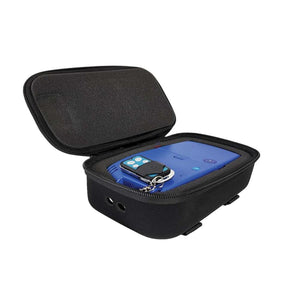 ExtremeMIST blue device and remote control inside a black foam lined carrying case