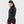 Woman wearing a black FjallRaven hooded fleece jacket