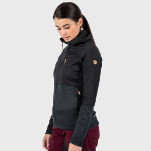 Woman wearing a black FjallRaven hooded fleece jacket