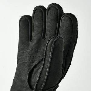 Hestra black leather glove with visible seams