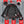 NexGen heated jacket interior features including hanging loop, removable hoodie, satin lining, and battery pocket