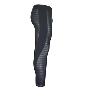 Black leggings with textured side panels and smooth fabric inserts