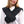 Person wearing a black Thermup heated neck wrap over a white sweater