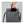 Hand placing a smartphone into the back pocket of a grey FjallRaven shoulder bag