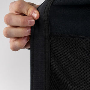 Close up of FjallRaven garment showing black mesh fabric and reinforced seam