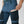 Fjallraven Abisko trekking trousers with a map in the zippered leg pocket