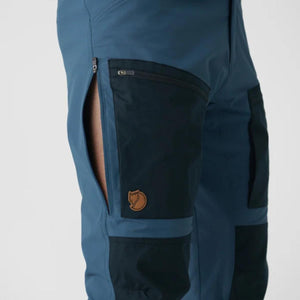 Fjallraven blue trekking trousers with open side ventilation zipper and dark contrast thigh pocket