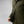 Close up of olive green FjallRaven fleece jacket showing zipper details and fabric texture